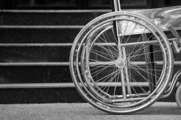 istock Empty wheelchair parked in hospital, black and white tone 687498414