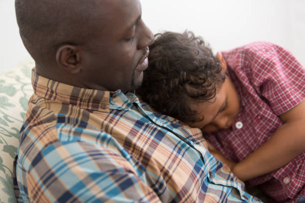 Father Comforting Upset Son