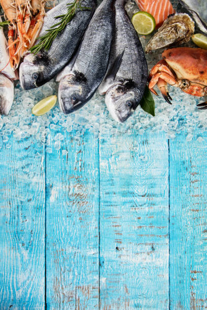 istock Bream fish with sea food, served on crushed ice 687516942