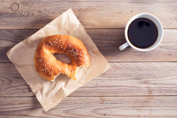 istock Pastry with coffee on wooden table 687519462
