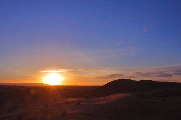 istock Beautiful sunset on the desert in Morocco 687523684