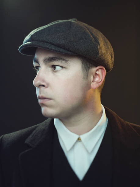 istock Young man in retro peaky blinders suit 687530698