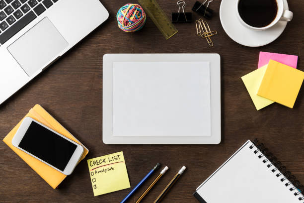istock top view of tablet and other digital devices on home office table 687531044