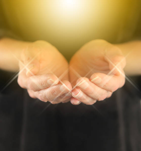 istock Healer with Golden Healing Orb Energy 687531496