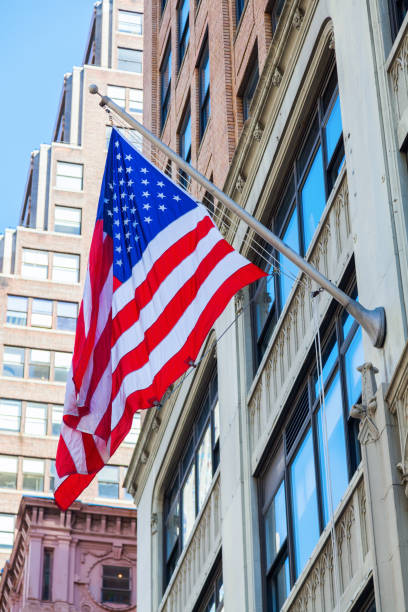 istock US flag at a building in  NYC 687554322