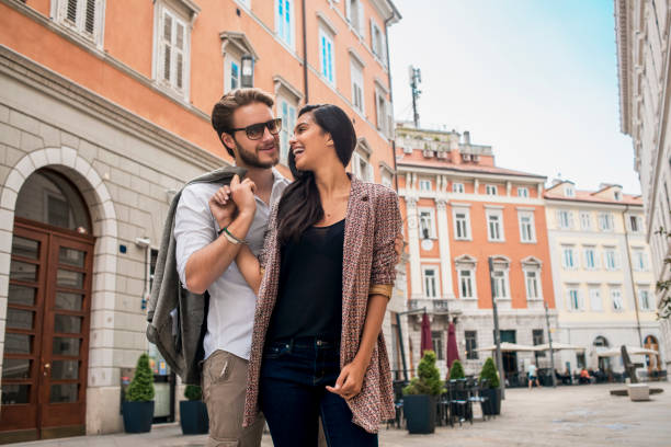 istock beautiful couple exploring the city 687561510