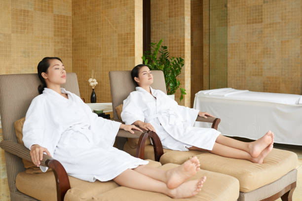 istock Asian Friends Relaxing in Spa Salon 687567254