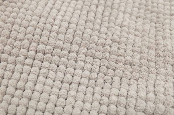 istock Detail of Brown Fluffy Fabric Texture Background 687575392