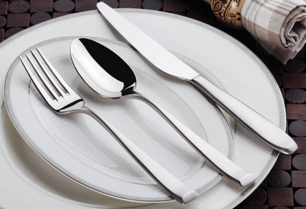istock Elegance cutlery arrangement on plate 687579742