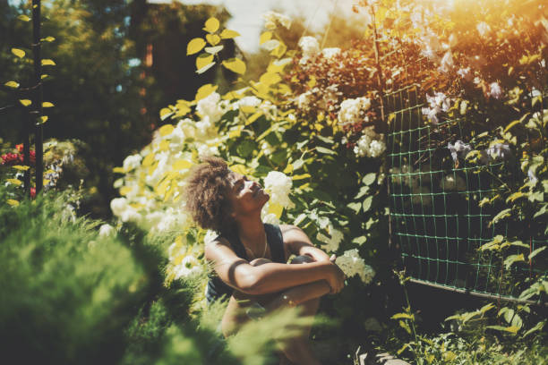 istock Mixed curly girl spending morning in park 687584030