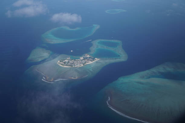 istock Look from the plane on islands, Maldives 687590242