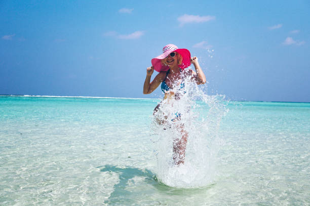 istock Blonde woman have fun on Maldives 687590258