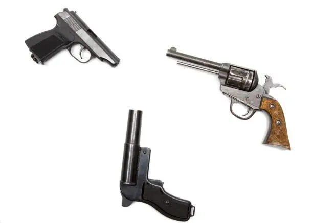 Combat weapons three pistols cut out on a white background