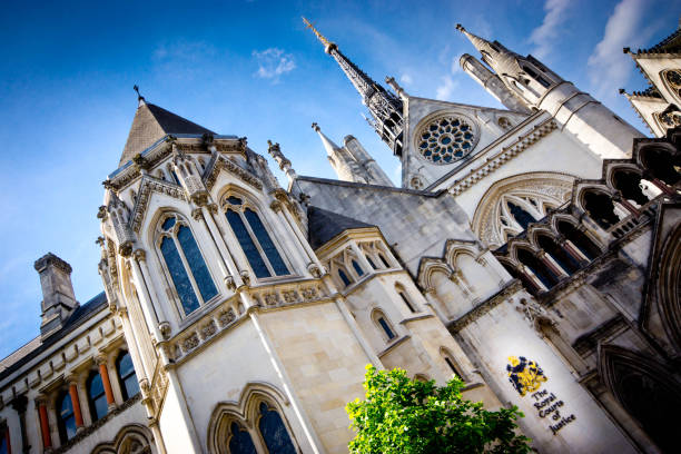 Royal Courts of Justice Exterior of the famous Royal Courts of Justice in London, situated on the Strand it is the  home of the High Court and the Court of Appeal and was designed by George edmund Street who dies before its completion. royal courts of justice stock pictures, royalty-free photos & images
