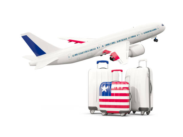 istock Luggage with flag of liberia. Three bags with airplane 687602716