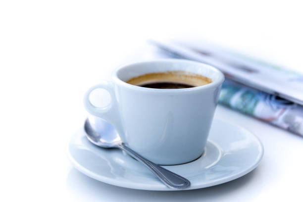istock Cup of coffee in morning with newspaper 687603066