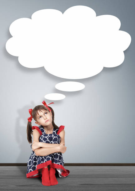 Thoughtful kid thinking with thought bubble Thoughtful kid thinking with thought bubble sad girl crouching stock pictures, royalty-free photos & images