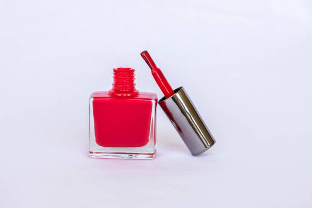 istock Red color nail polish isolated on white background 687636336