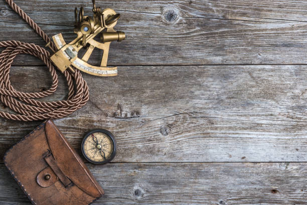 vintage still life with compass,sextant and spyglass stock photo