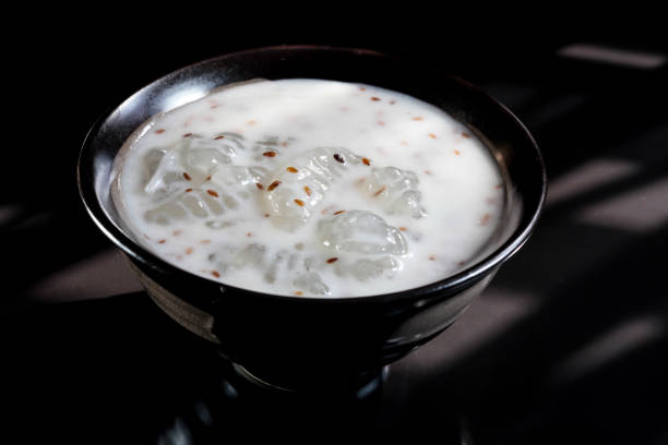 istock Caramelized crisps in coconut sauce. Thai dessert. 687649324