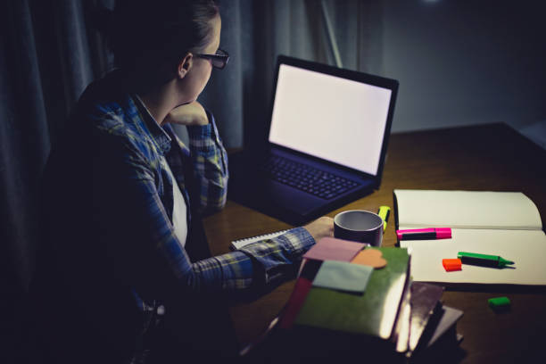 istock Single tired woman working late 687650164