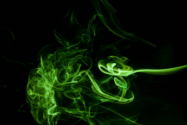 istock Green smoke movement on black background. 687652990