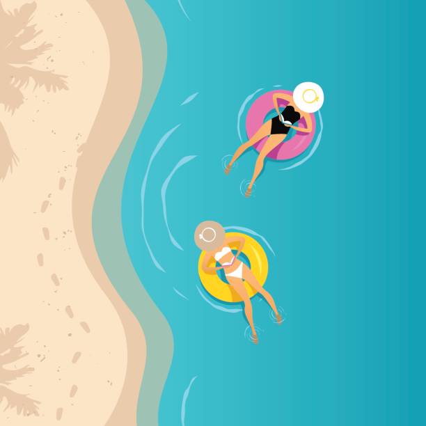 ilustrações, clipart, desenhos animados e ícones de duas mulheres nadando no anel inflável - wave island palm tree sea