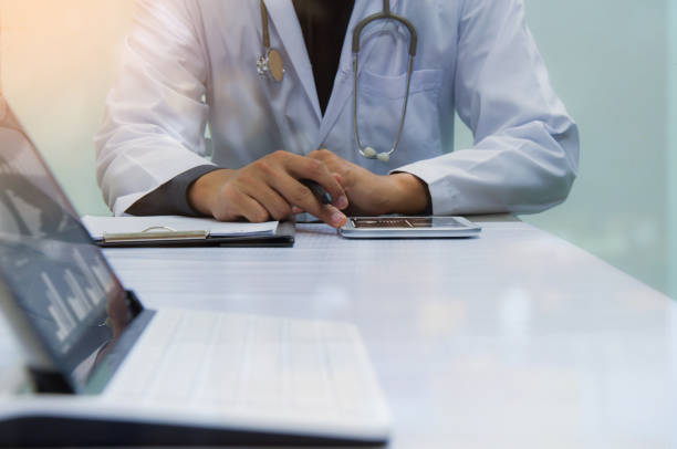 istock medicine doctor working with computer notebook and digital tablet 687656886