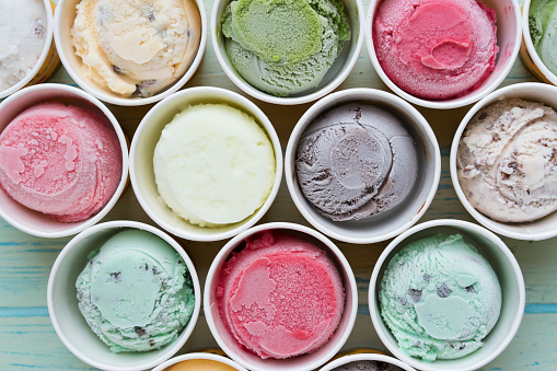 Top view Ice cream flavors in cup on blackground