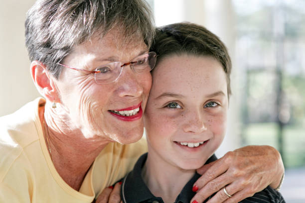 istock Grandmother Hugs Her Grandson 687663736