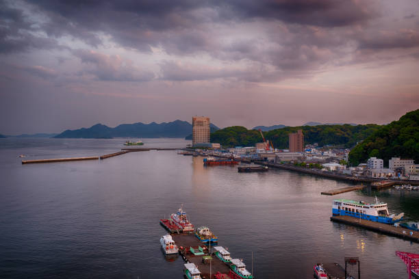 istock Cloudy sunset on Hiroshima port, Japan 687675530