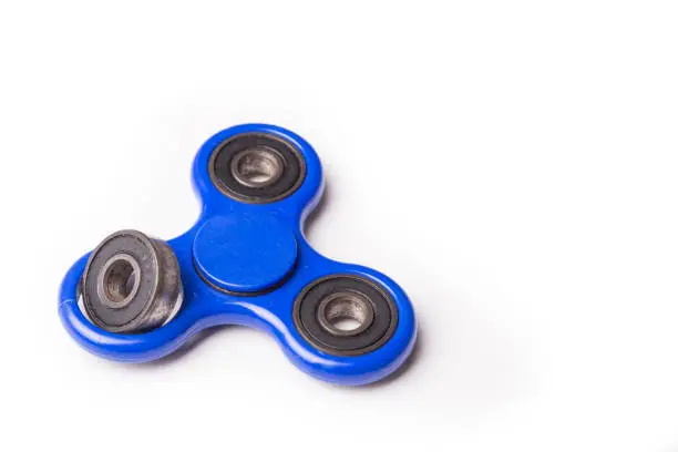 Photo of Dislodged broken weight from fidget spinner dangerous to kids
