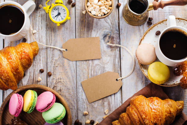 istock Tasty breakfast with coffee, croissants and macaroons 687678710
