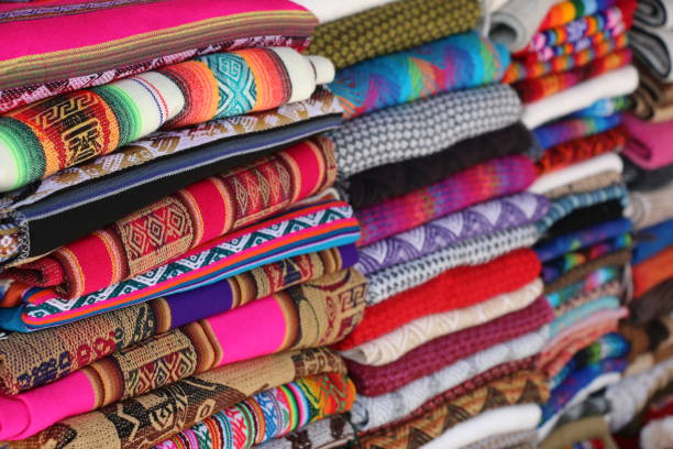 istock Brightly coloured blankets in Ollantaytambo market, Peru 687678908