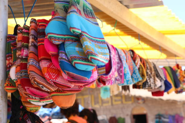 istock Colorful kitchen gloves hanging at market in Peru. 687678910
