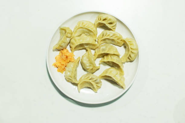 istock Momo, served hot on a plate, stock photograph 687679140