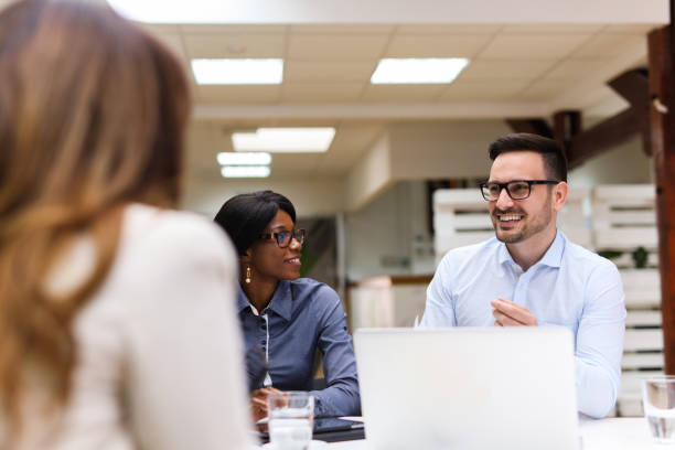 istock Business people discussing strategy with a financial analyst 687684810