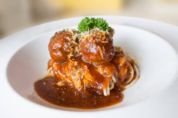 Spaghetti with pork balls in tomato sauce.