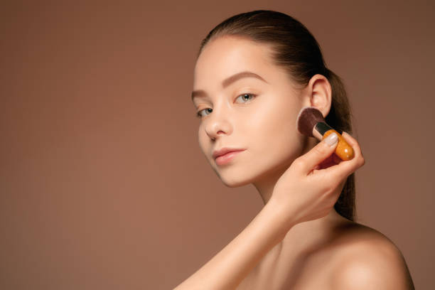 istock Beautiful female eyes with make-up and brush 687685748