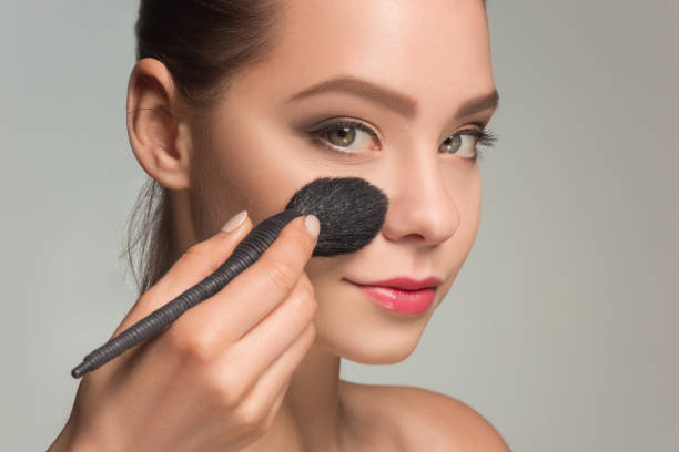 istock Beautiful female eyes with make-up and brush 687686248