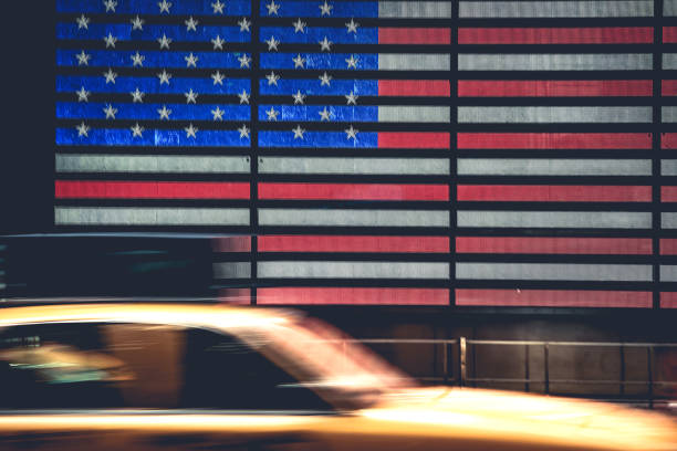 istock Yellow cab in front of American Flag 687686582