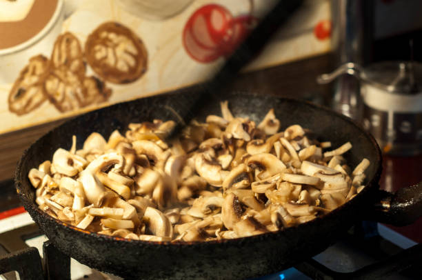 istock roasted mushrooms with onion in a pan 687686668