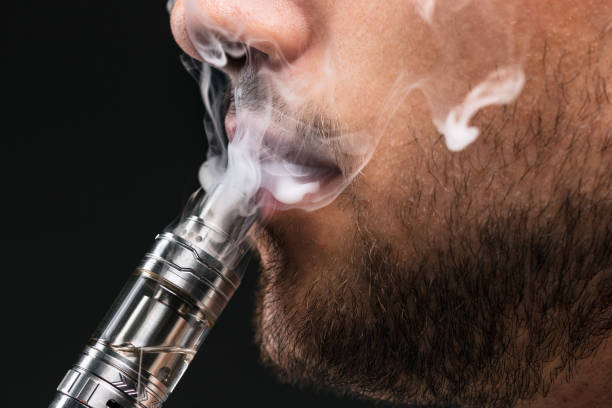 istock The face of vaping young man 687689294
