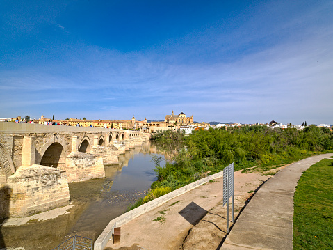 The Roman Bridge of Cordoba, Andolusia, Spain. The Roman bridge which, according to the Arab geographer, Al-drisi surpasses all other bridges in beauty and solidity, reflects little of its Roman roots.