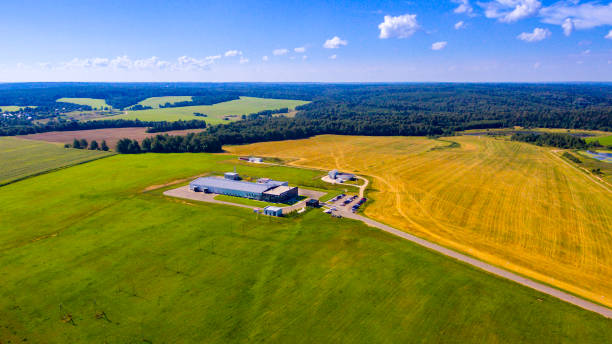 istock Aerial view on modern farm buildings 687698996