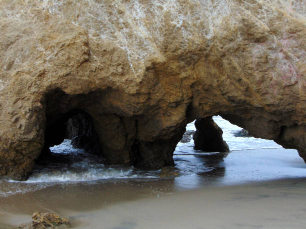 istock Sea Caves in the Morning Tide 687708402