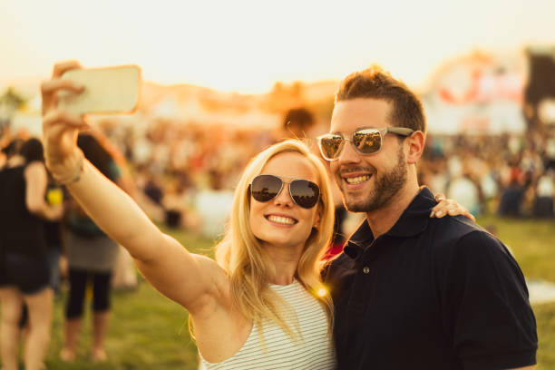 istock festival couple selfie 687716374
