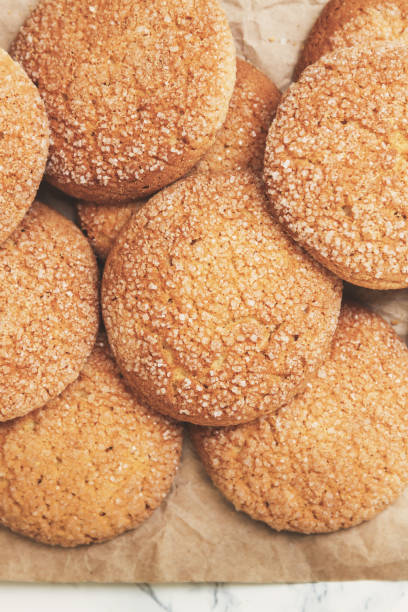 istock sand round cookies, top view, close-up. Empty place for records. In retro, old style 687717104