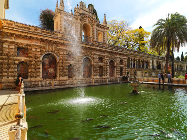 The Alhambra Palace in Granada, Andolusia, Spain. April 4, 2015. There many flowers, plants, gardens and historical buildings.