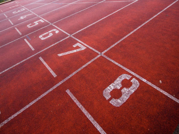 istock close up of a running track in rain 687722298
